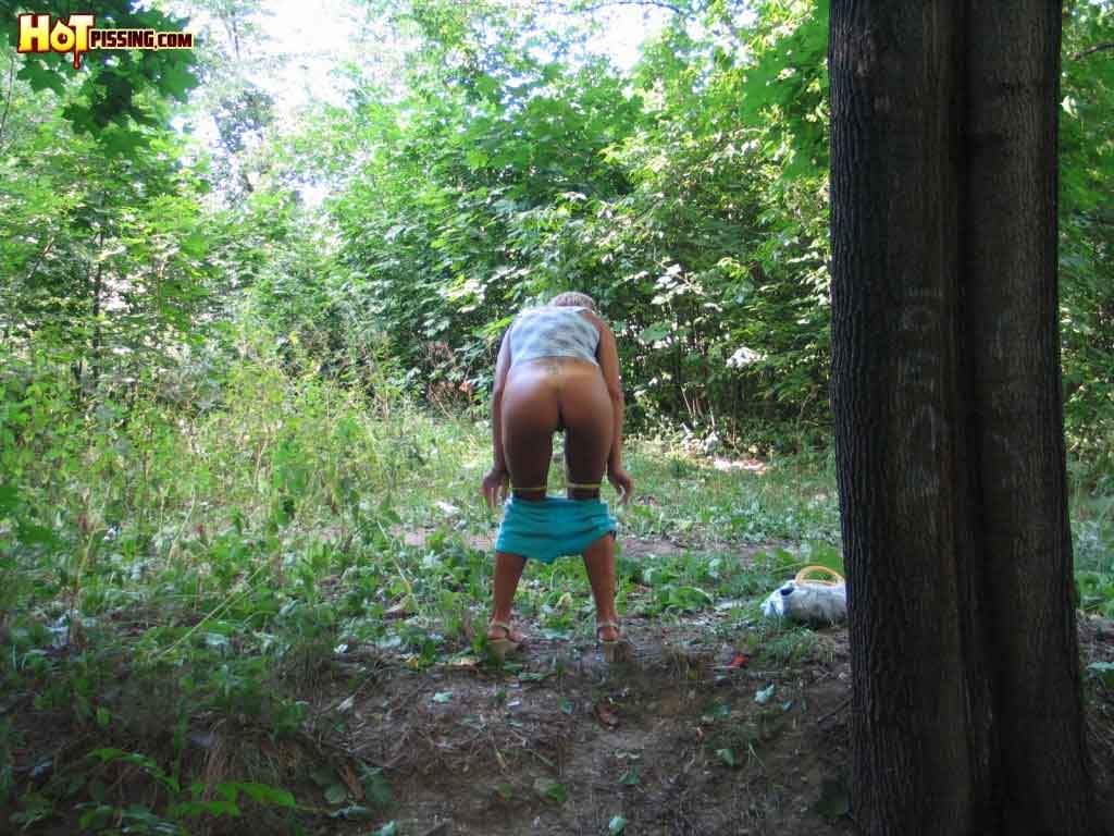 Girl peeing outdoors #76594059