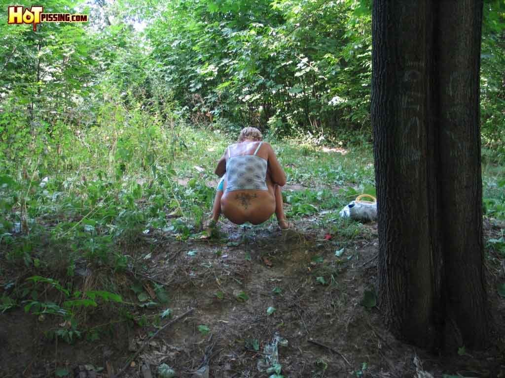 Girl peeing outdoors #76594081