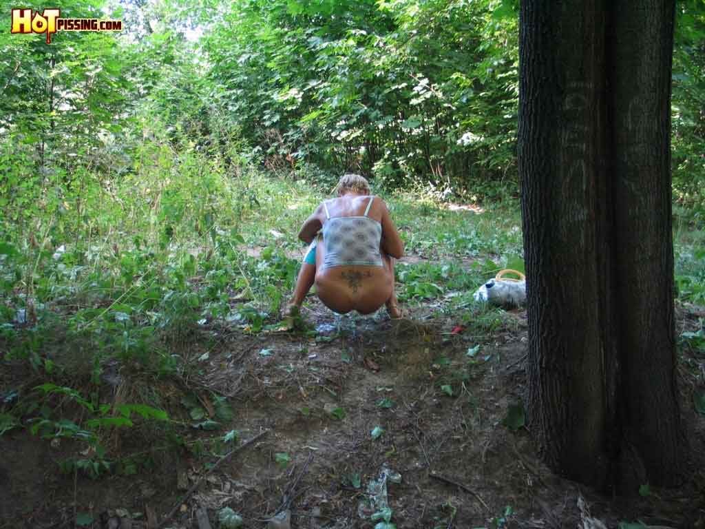 Girl peeing outdoors #76594102