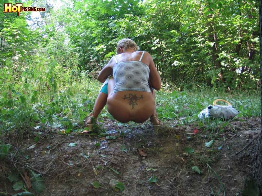 Girl peeing outdoors #76594122