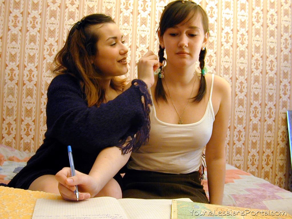 Two beautiful young lesbians enjoy stretching their pussies after doing their ho #76183247