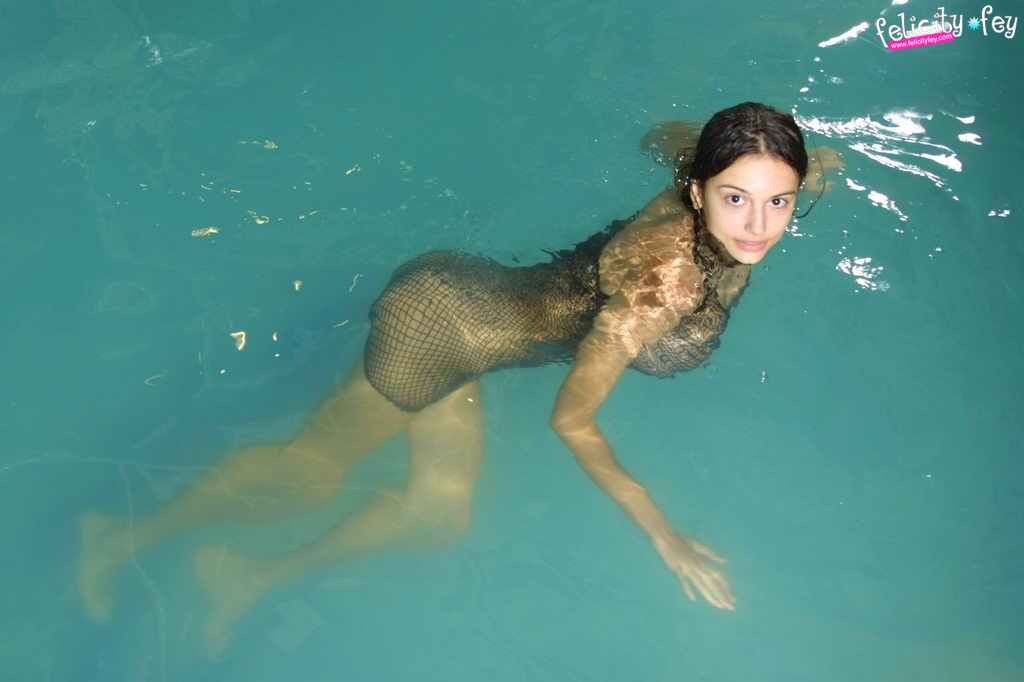 Busty latina in fishnet skirt having fun at the pool #77976386