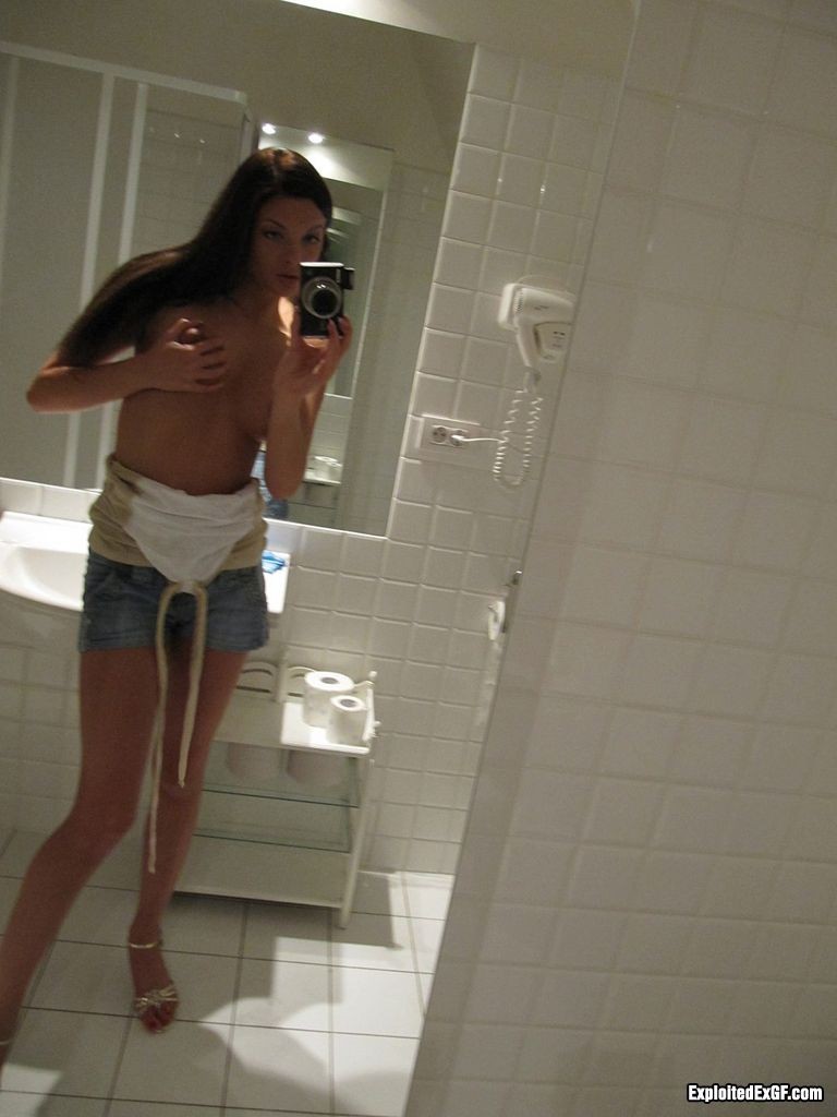 Beautiful tiny chick shooting herself nude in bathroom #67618812
