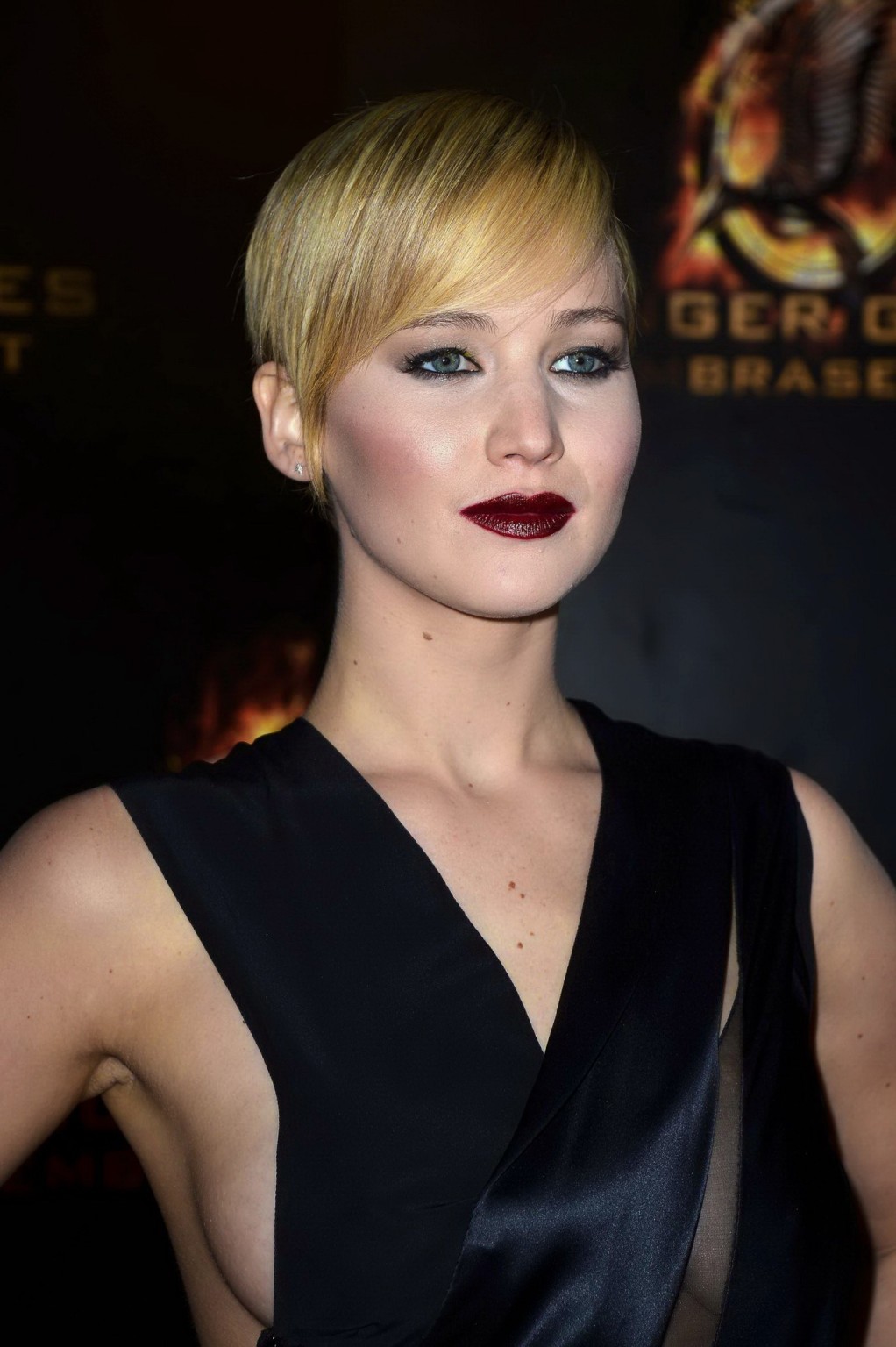 Jennifer Lawrence braless wearing skimpy black dress at The Hunger Games:Catchin #75212997