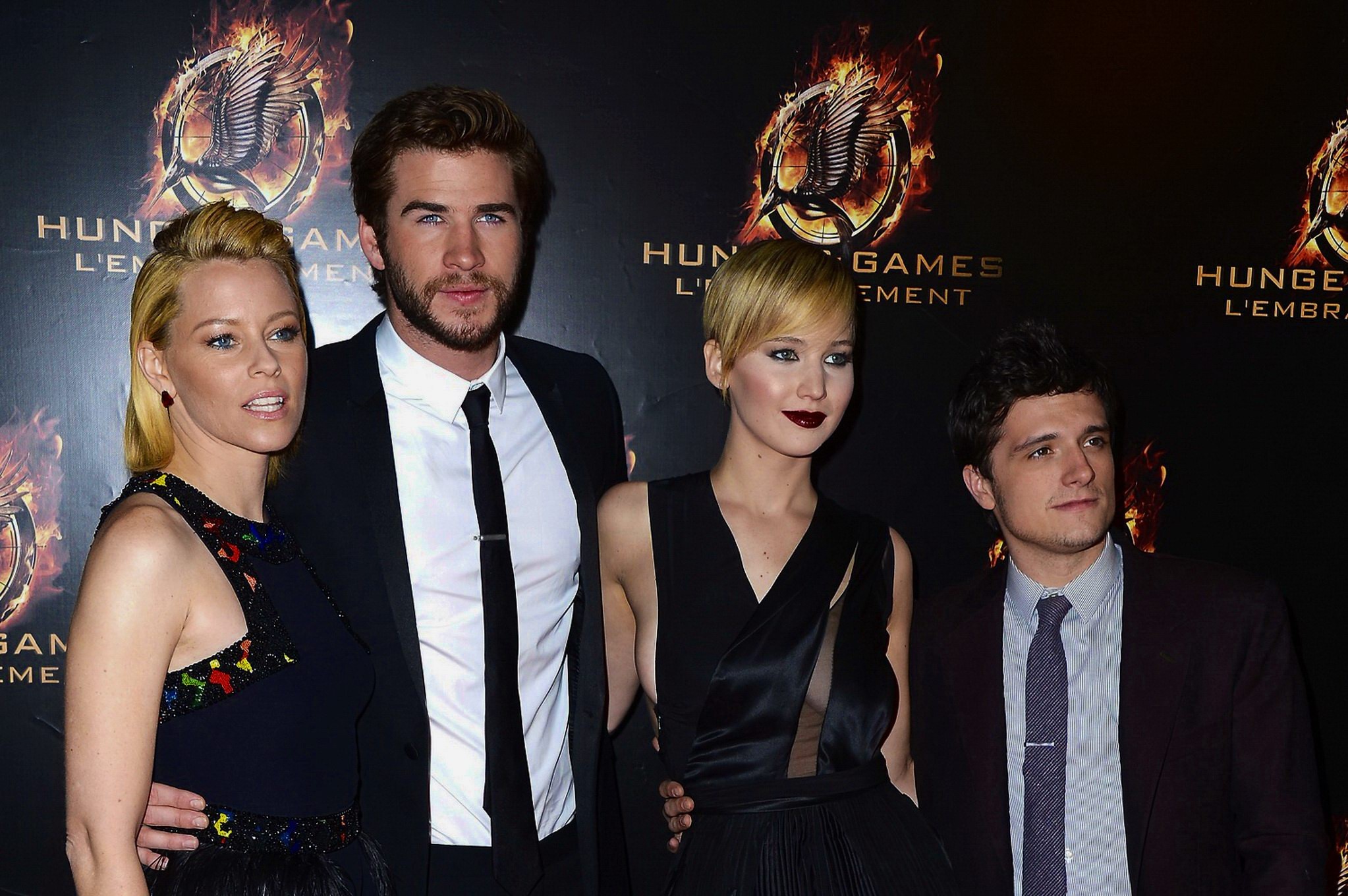 Jennifer Lawrence braless wearing skimpy black dress at The Hunger Games:Catchin #75213115
