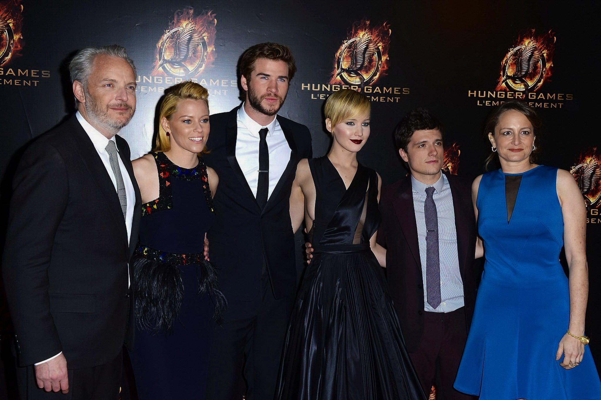Jennifer Lawrence braless wearing skimpy black dress at The Hunger Games:Catchin #75213125