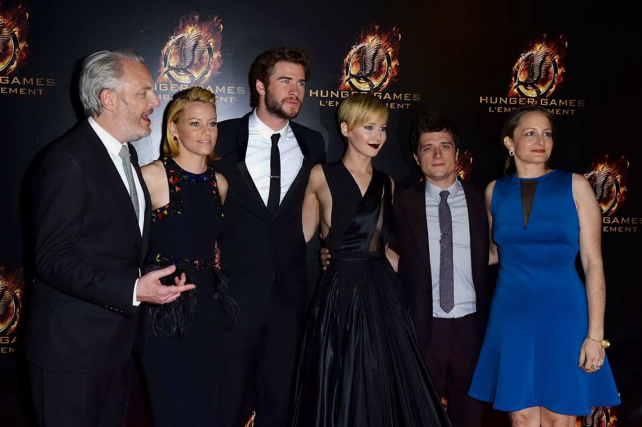Jennifer Lawrence braless wearing skimpy black dress at The Hunger Games:Catchin #75213226