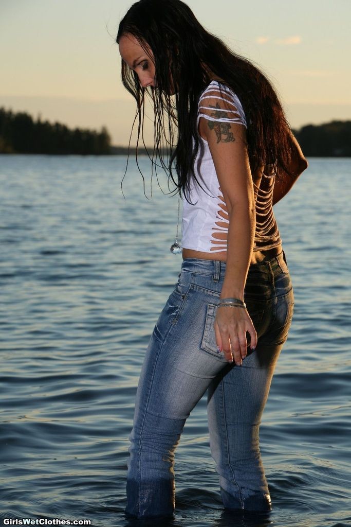 Wet sexy jeans girl swimming #72314754