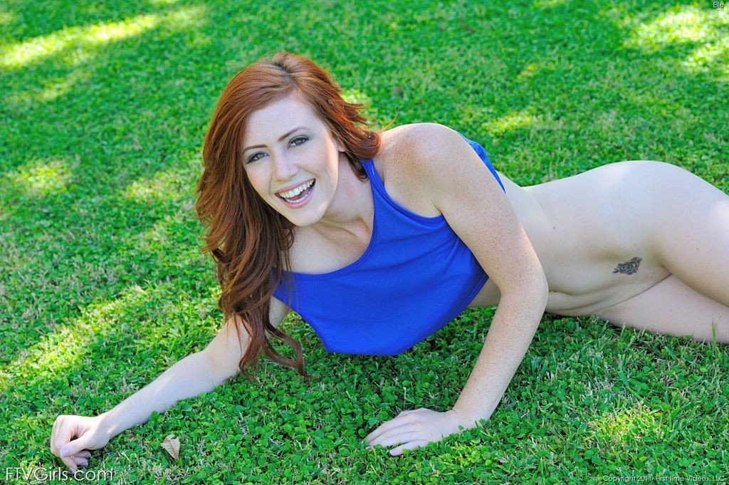 Cute redhead does pussy flashing cartwheels in park #72410626