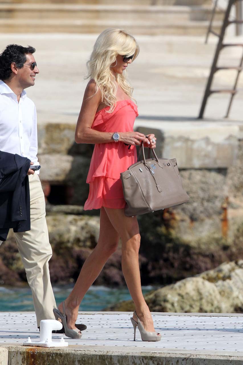 Victoria Silvstedt looking sexy and leggy in red mini skirt paparazzi pictures #75303799