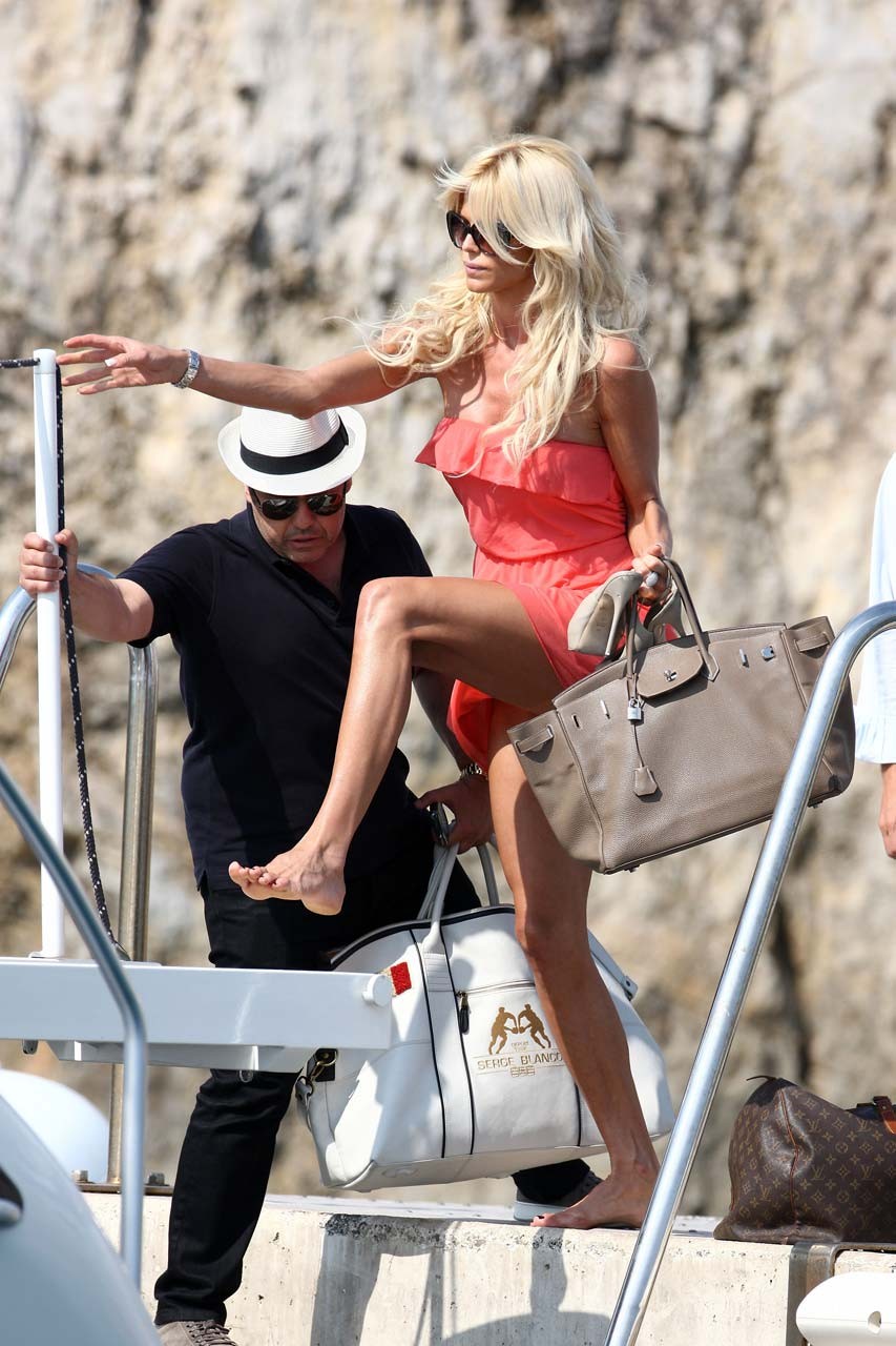 Victoria Silvstedt looking sexy and leggy in red mini skirt paparazzi pictures #75303831