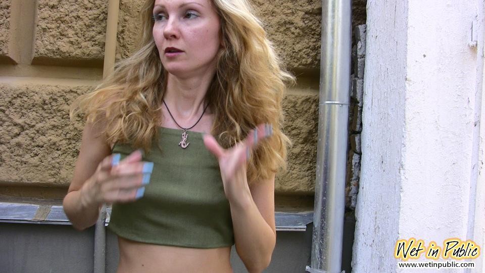 Blonde slim slut in green does a lil job right in the pants in public #73241228