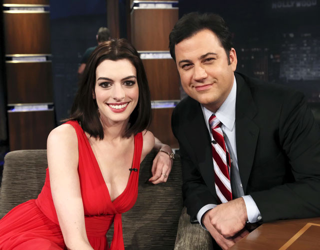 Anne Hathaway showing her legs in red mini skirt #75404980