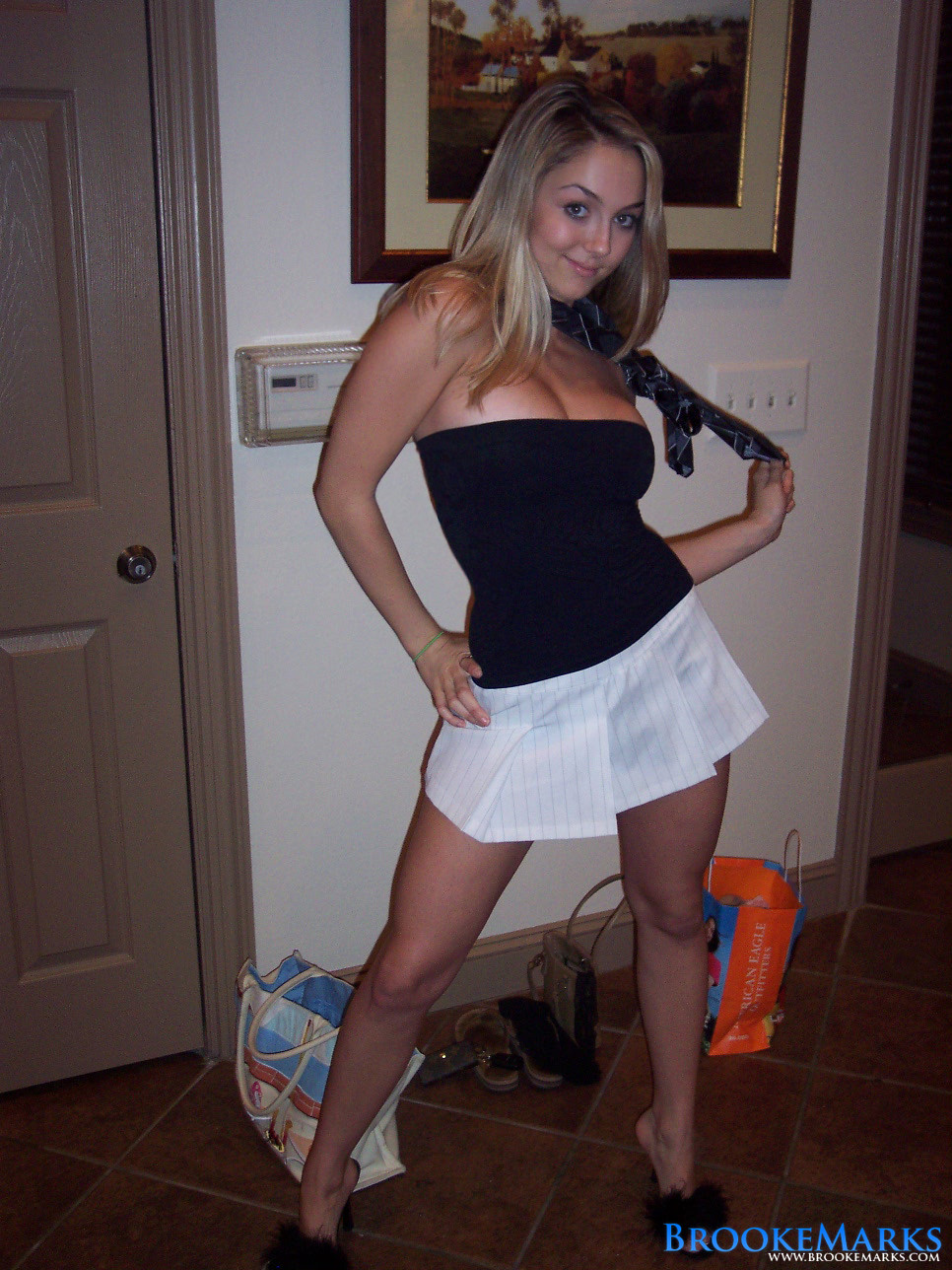 Pretty blonde in her very short white skirt #70895810