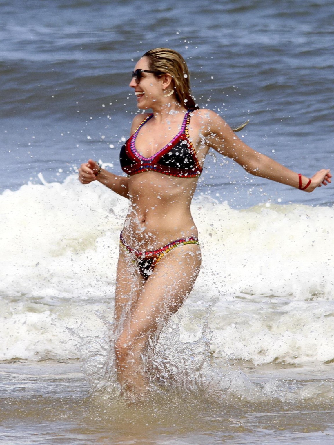 Kelly Brook showing off her curvy bikini body on a beach in Ibiza #75274701