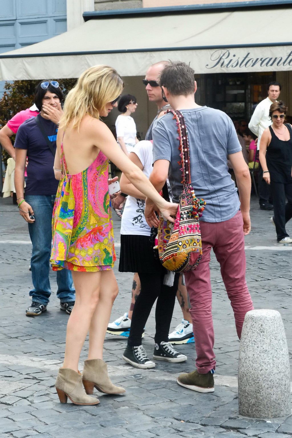 Kate Hudson braless wearing colorful bare back mini dress out in Rome #75225279