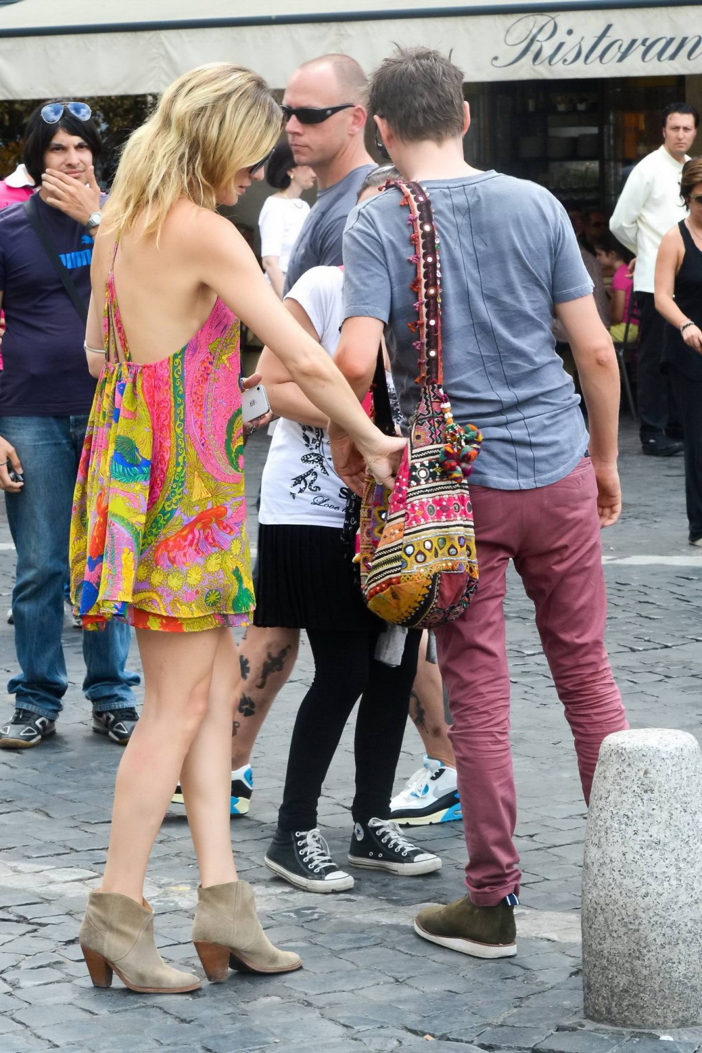 Kate Hudson braless wearing colorful bare back mini dress out in Rome #75225281