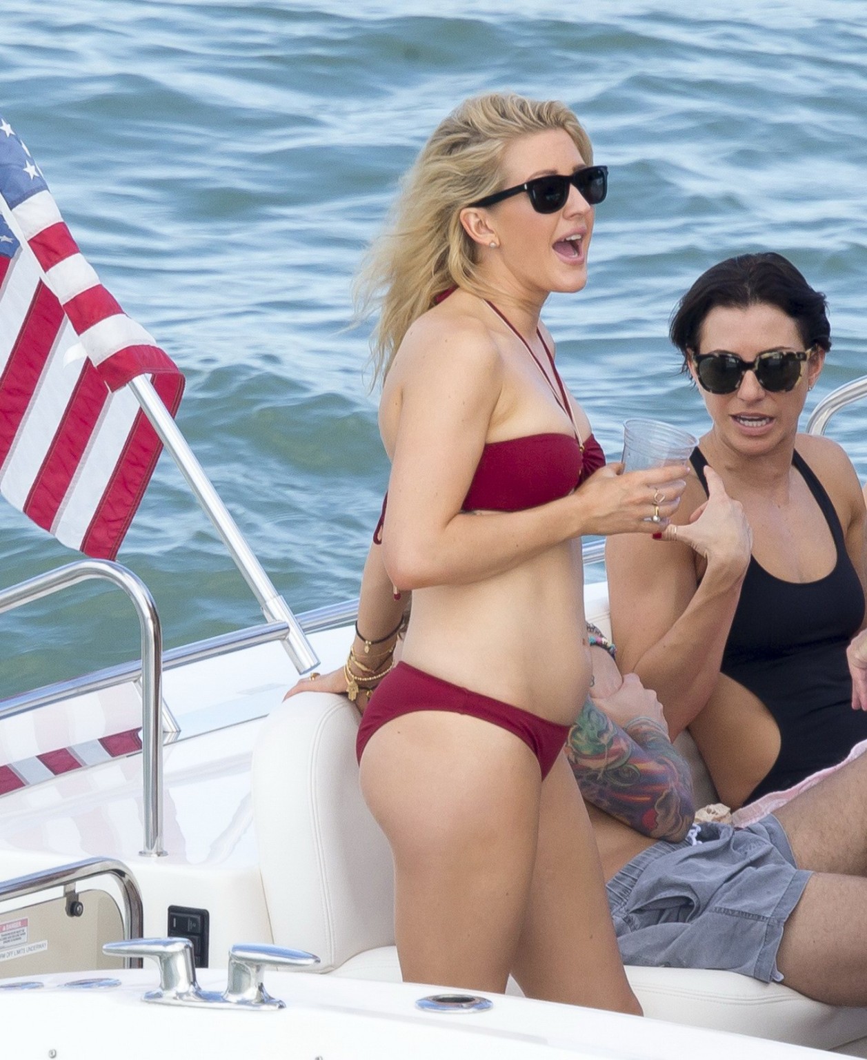 Ellie Goulding showing her ass in skimpy cherry colored bikini at the boat in Mi #75177081