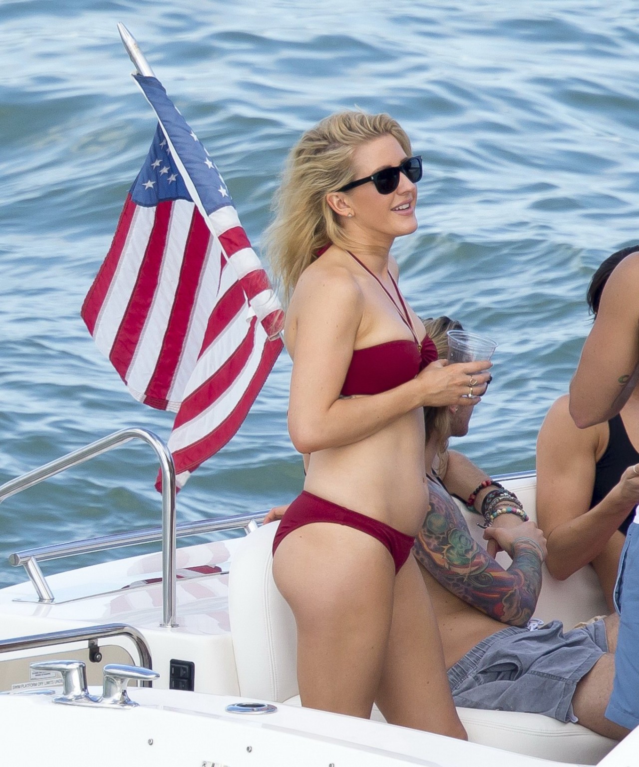 Ellie Goulding showing her ass in skimpy cherry colored bikini at the boat in Mi #75177087