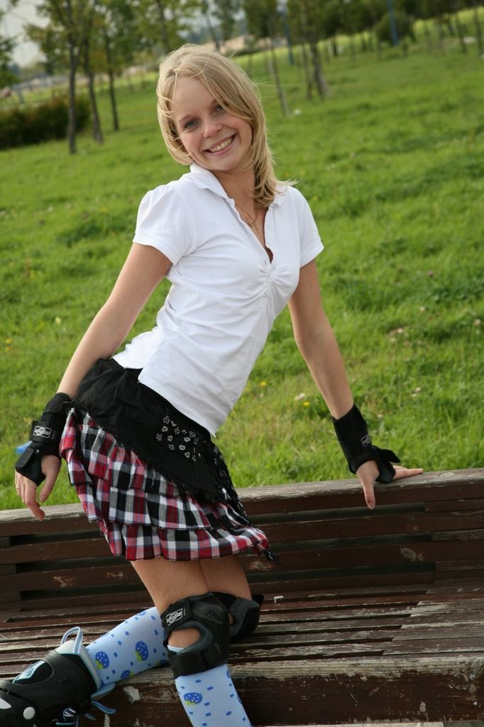 Teen spreads pussy in the park on rollerblades #78659028