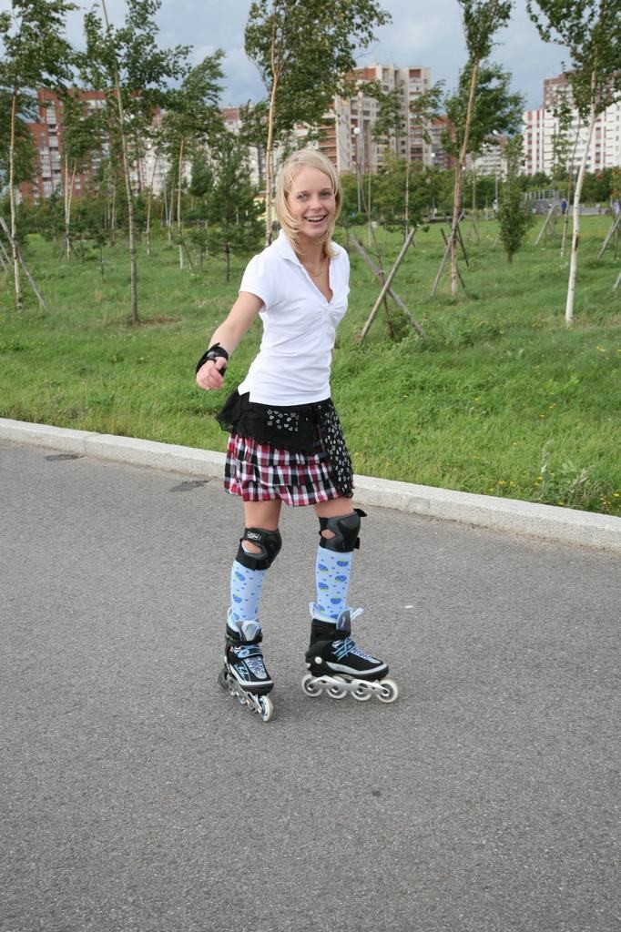 Teen spreads pussy in the park on rollerblades #78659033