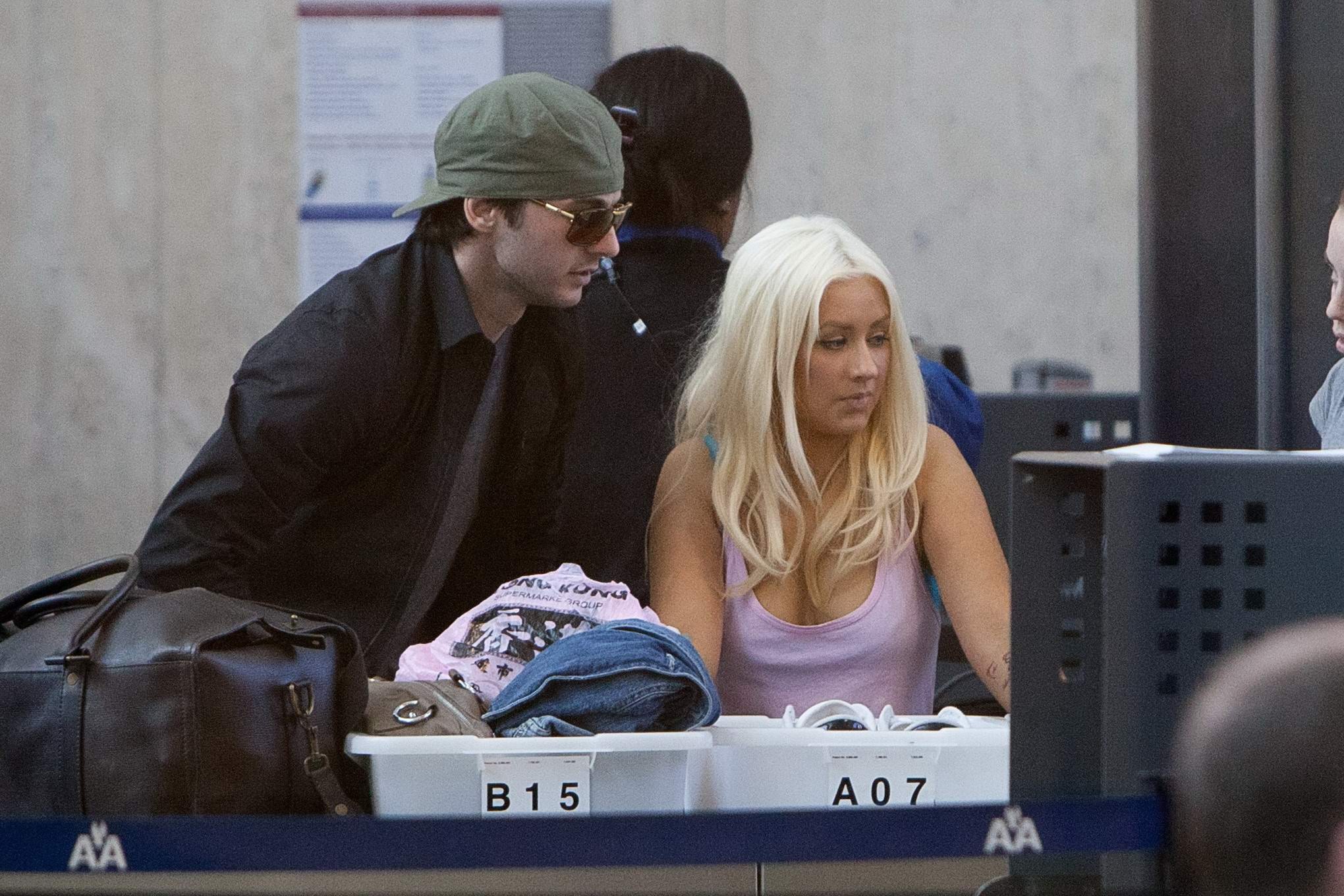 Christina Aguilera shows huge cleavage departing from LAX Airport #75305997