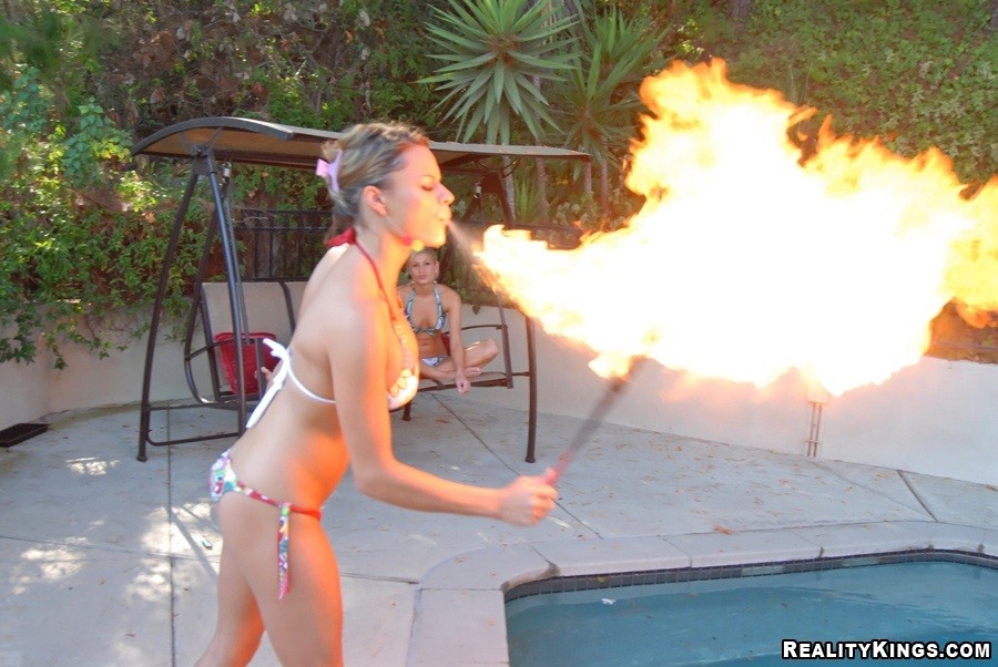 Amazing bikini babes nikki and shay play by the pool with amazing  fire breather
