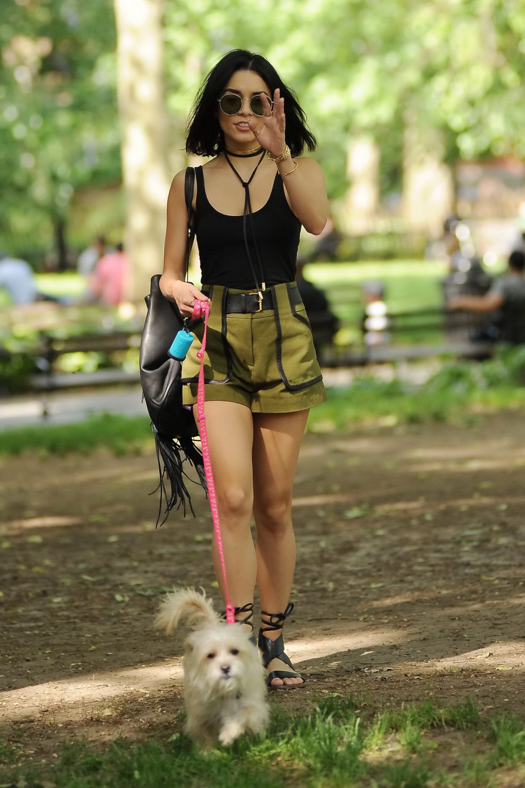 Vanessa Hudgens in a tiny black tank top and shorts takes her dog at a park in N #75162918