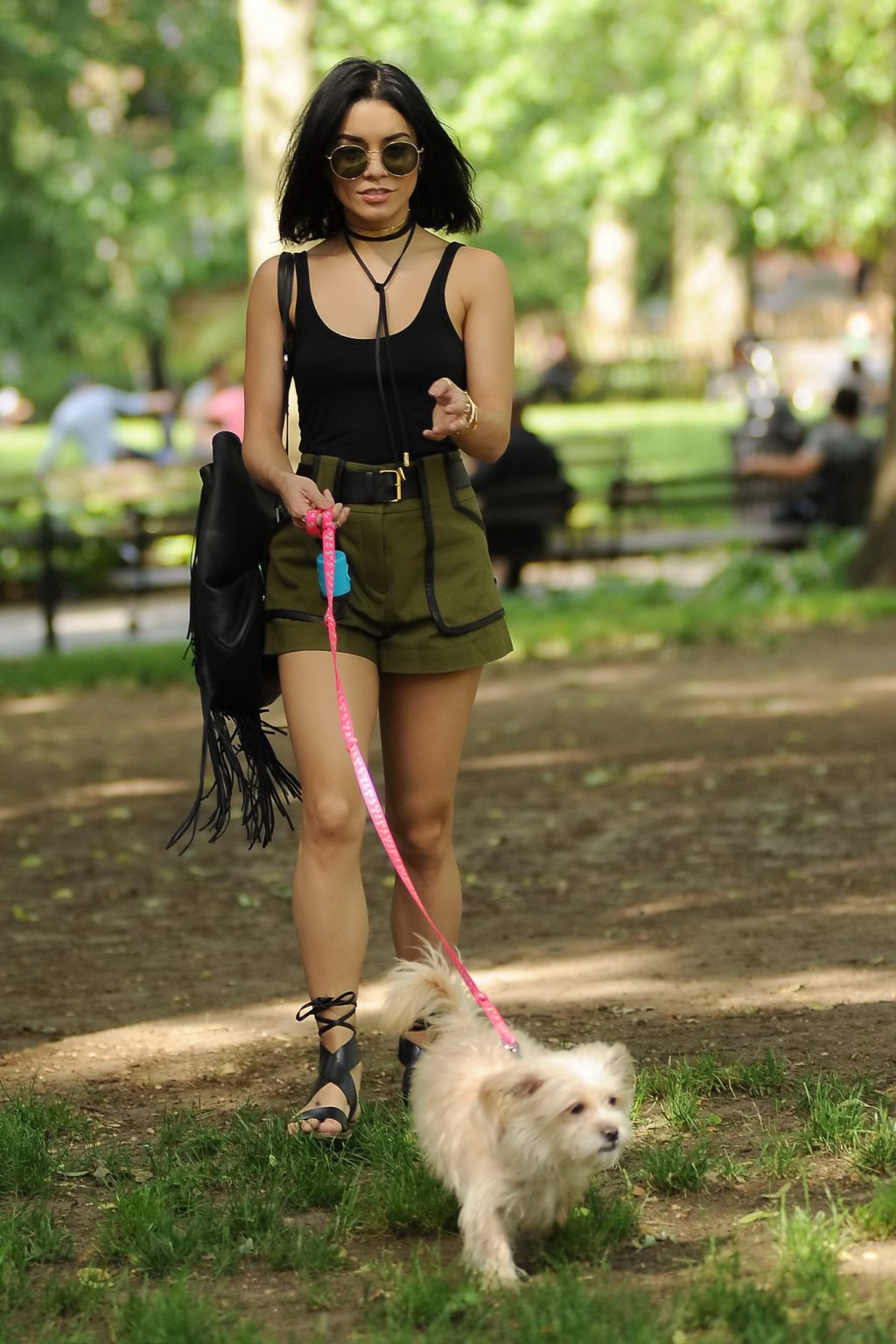 Vanessa Hudgens in a tiny black tank top and shorts takes her dog at a park in N #75162927