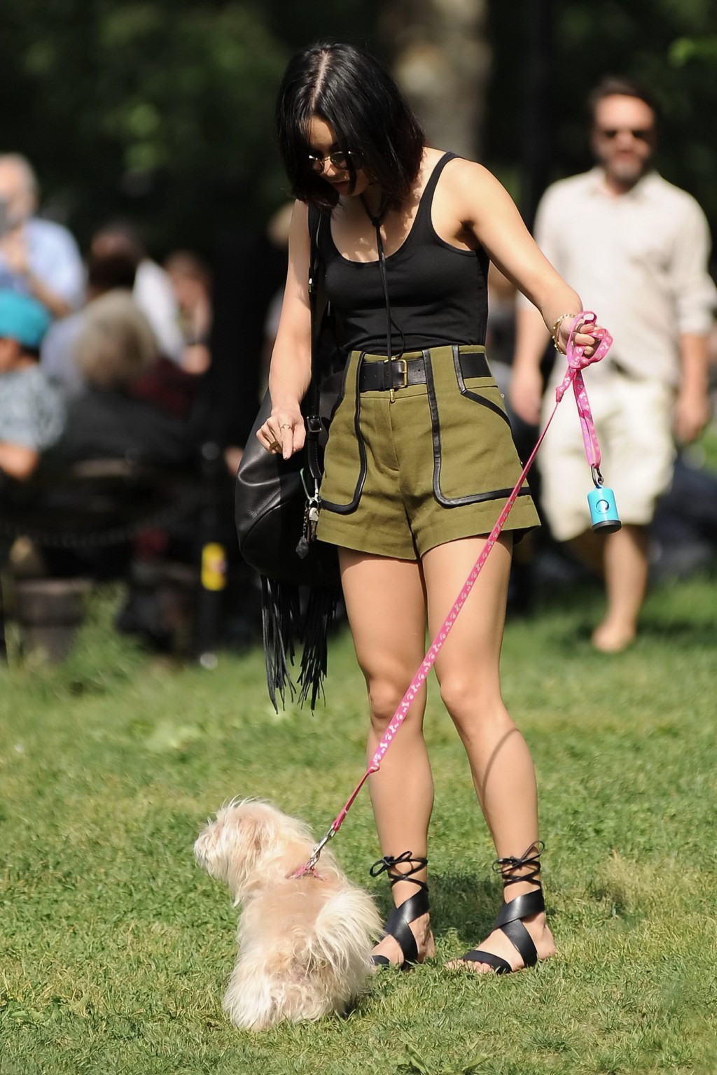 Vanessa Hudgens in a tiny black tank top and shorts takes her dog at a park in N #75162966