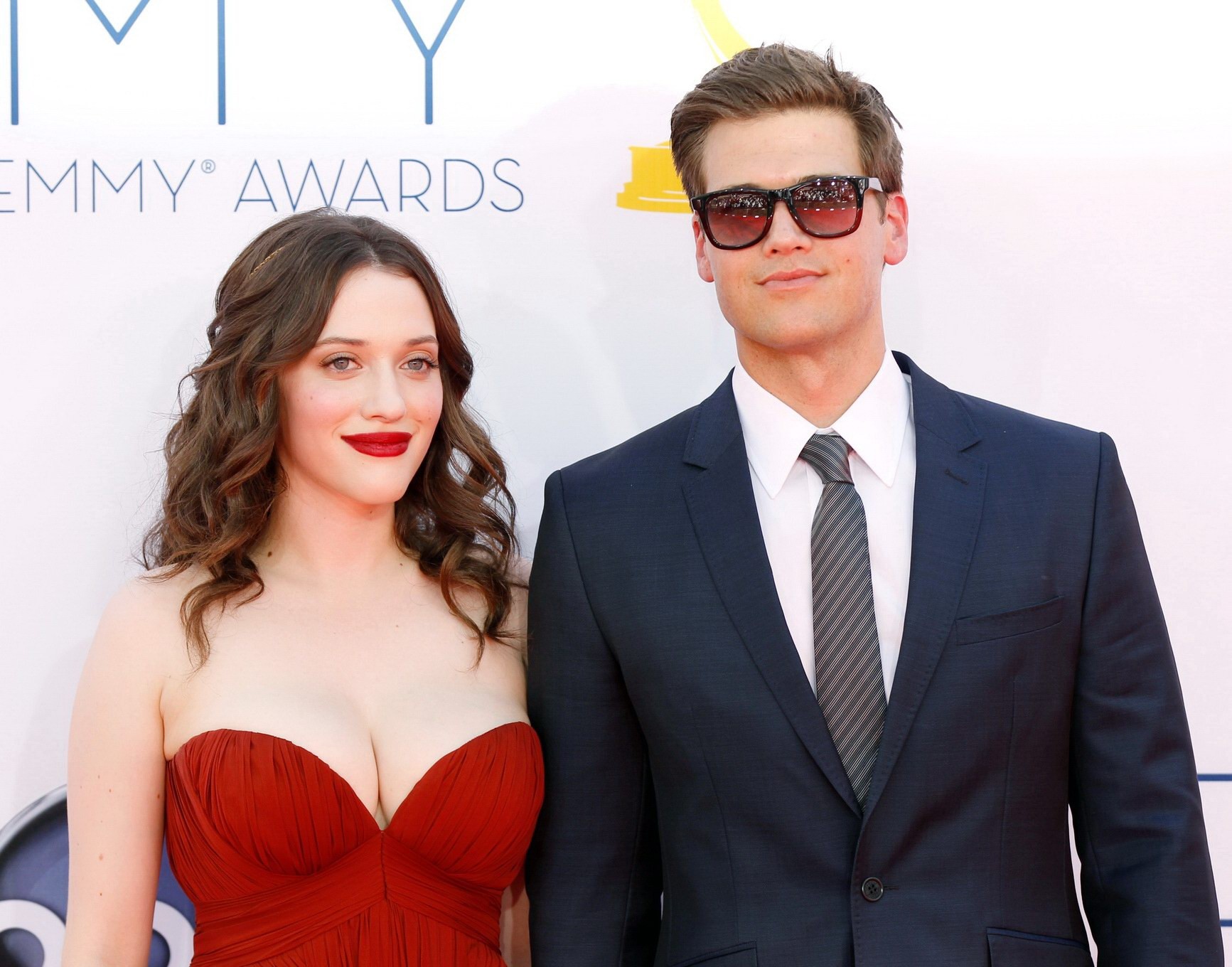 Kat Dennings busty wearing a strapless red dress at 64th Primetime Emmy Awards i #75252140