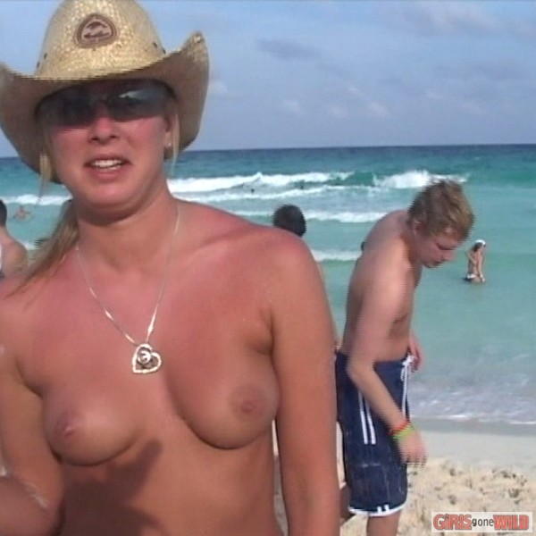 Drunk cowgirl on the beach takes off her top #72321037