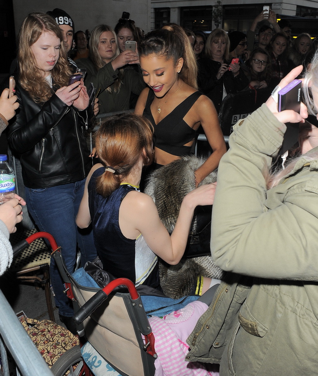 Ariana Grande wears skimpy black belly top and short skirt at BBC Radio 1 In Lon #75183869