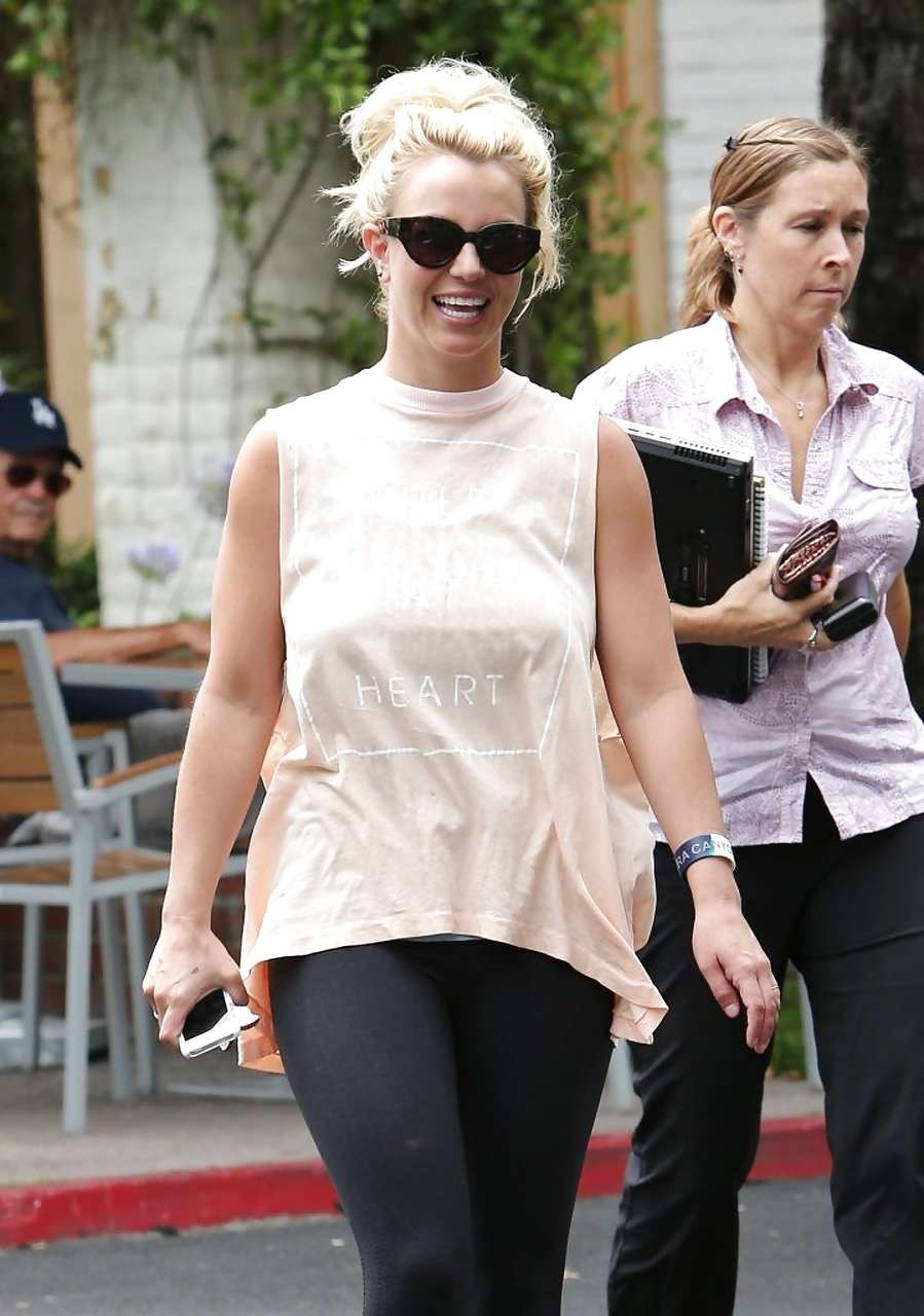 Britney Spears showing boobs in see thru shirt on street #75226216