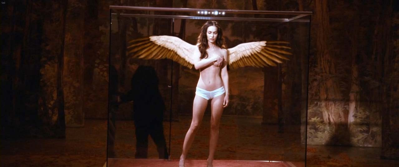 Megan Fox posing topless as angel and showing sexy body in bikini on beach #75303565