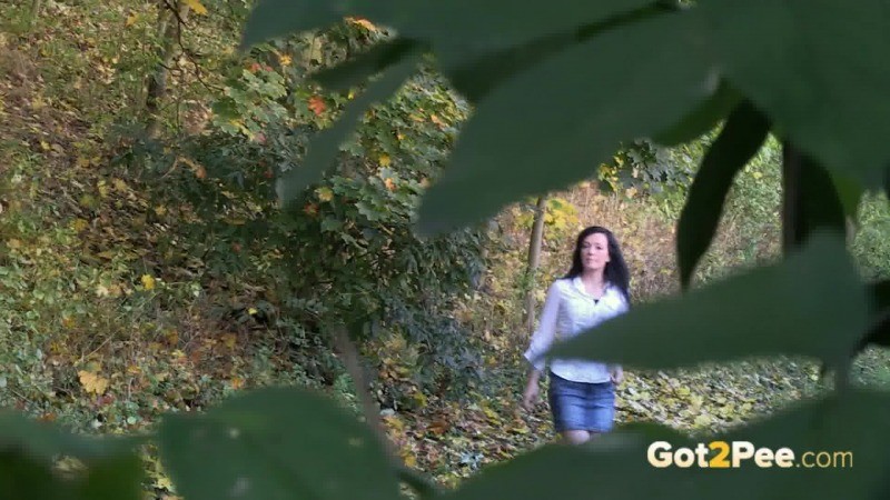 Sexy raven haired girl pisses in the leaves #67489816