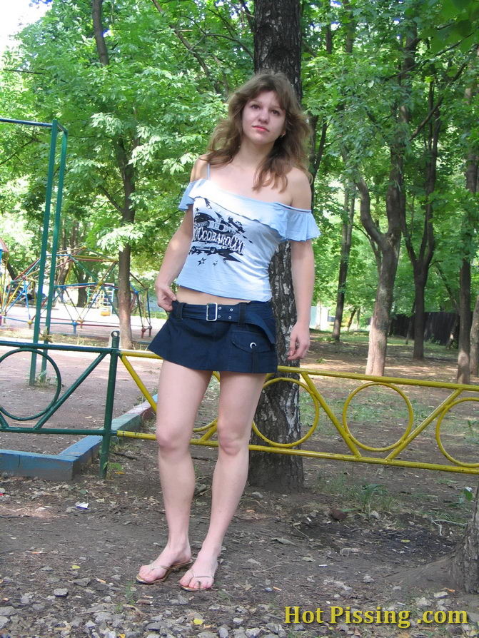 Pretty fair-haired girl makes a piss and flashes her pussy in the yard #76573323