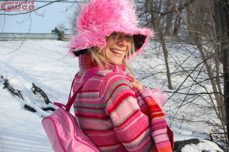 Beautiful blonde Gwen in pink playing in the snow #74020035