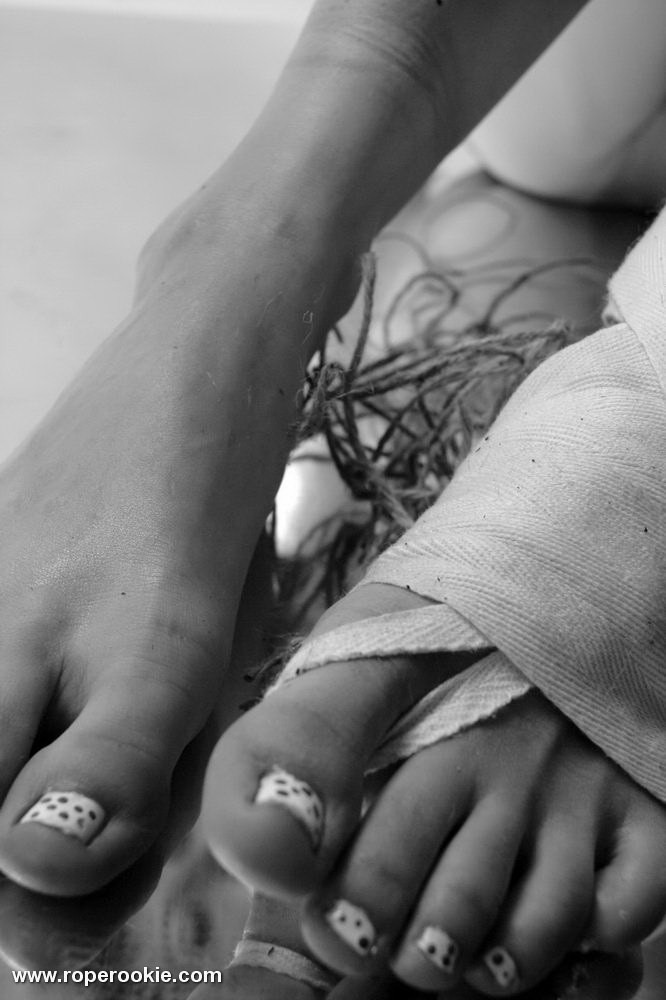 Skinny model tied and roped up in a cold room. #71998872