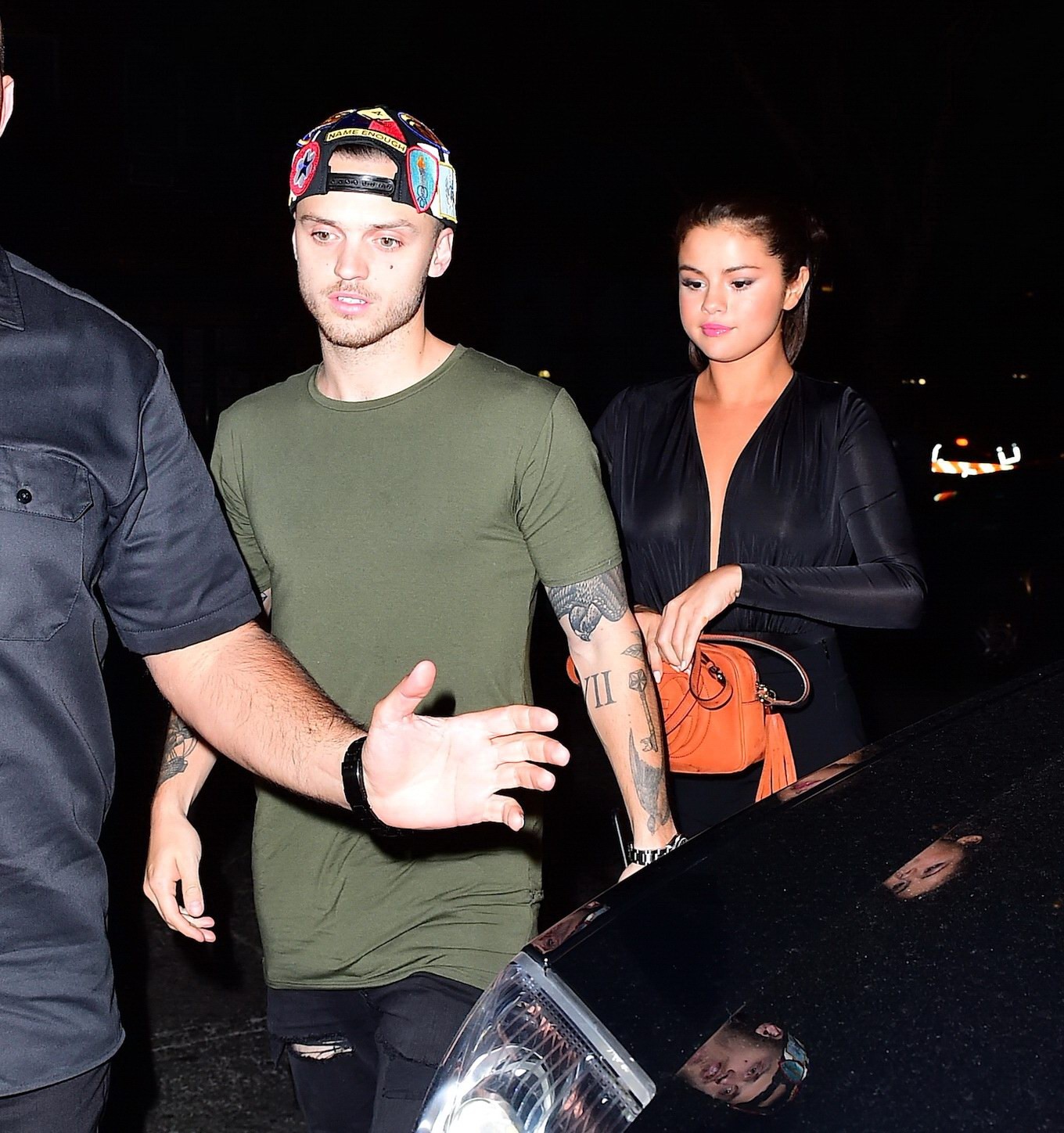 Selena Gomez braless wearing a wide open shirt on a night out #75160586