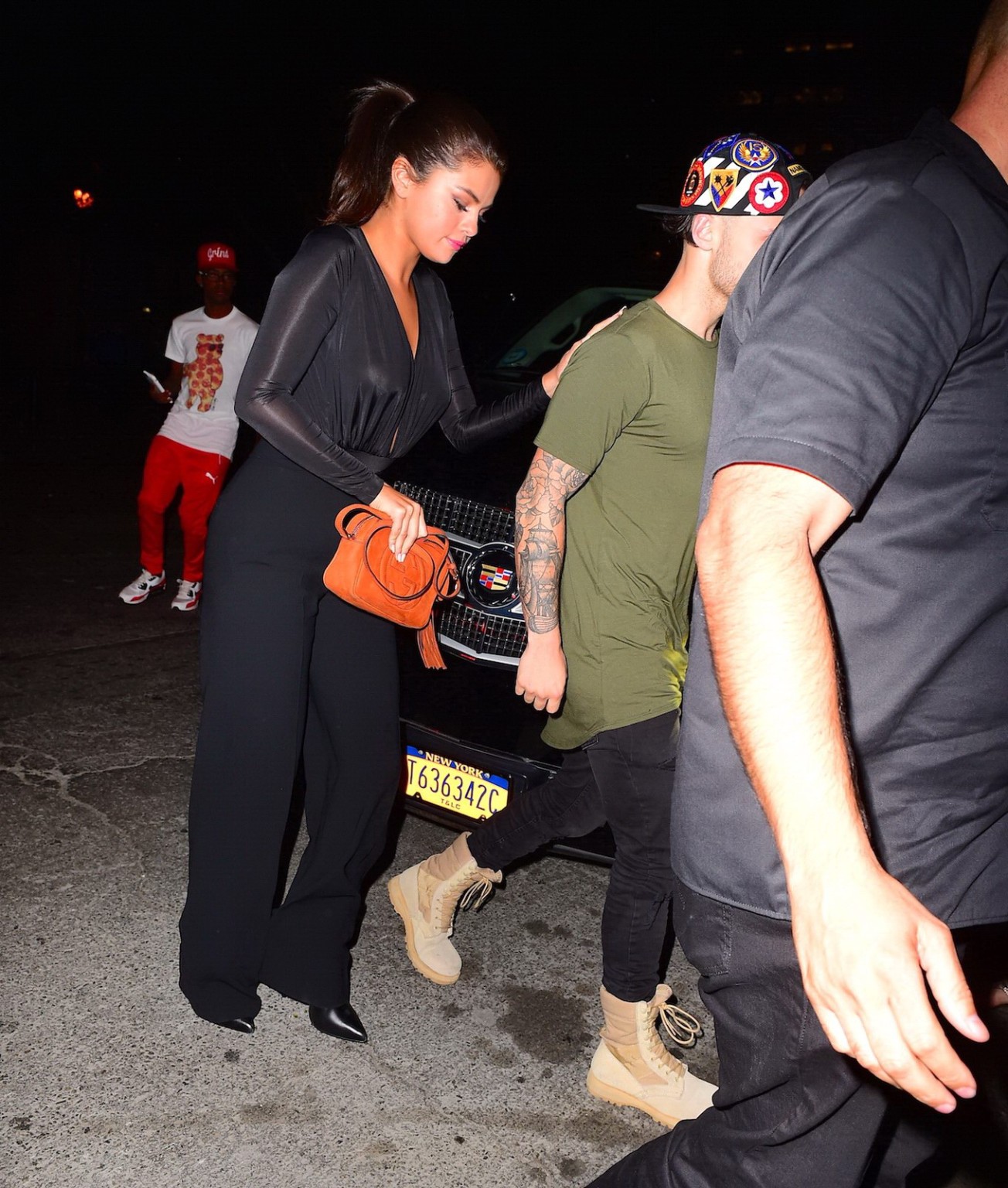Selena Gomez braless wearing a wide open shirt on a night out #75160601