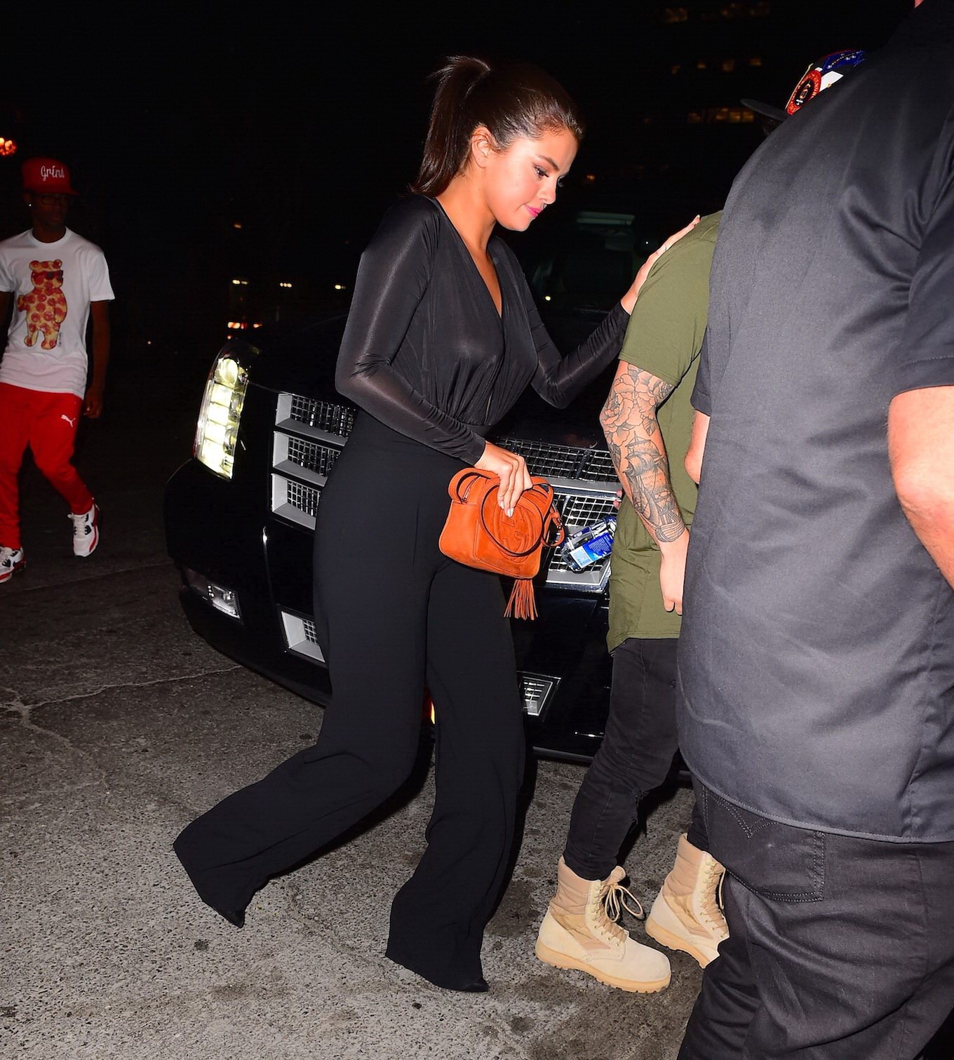 Selena Gomez braless wearing a wide open shirt on a night out #75160622