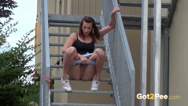 Sexy brunette pees on the aluminium steps #67466936