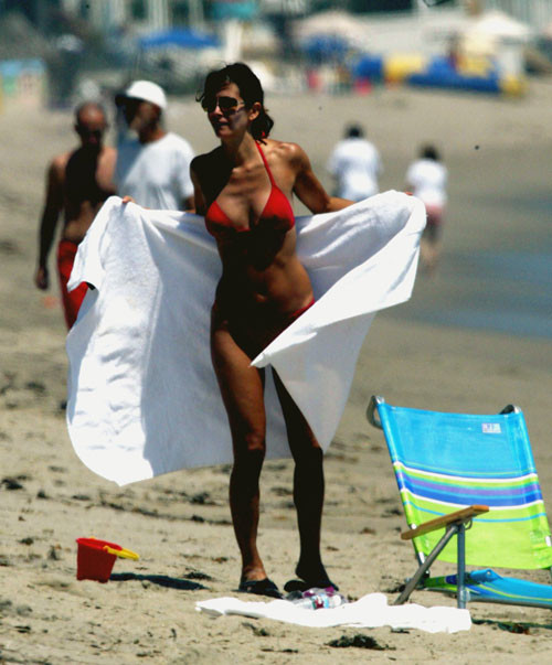 Courtney Cox nipple slip and bikini beach paparazzi pictures #75439921