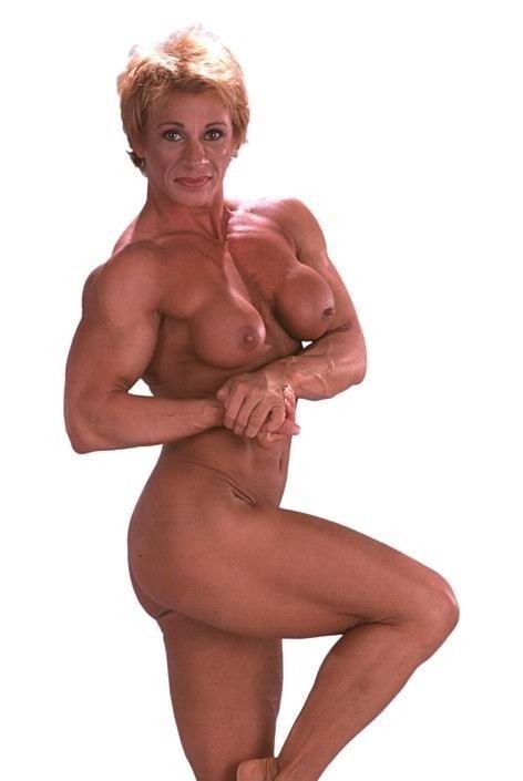female bodybuilders posing and in action #76492038