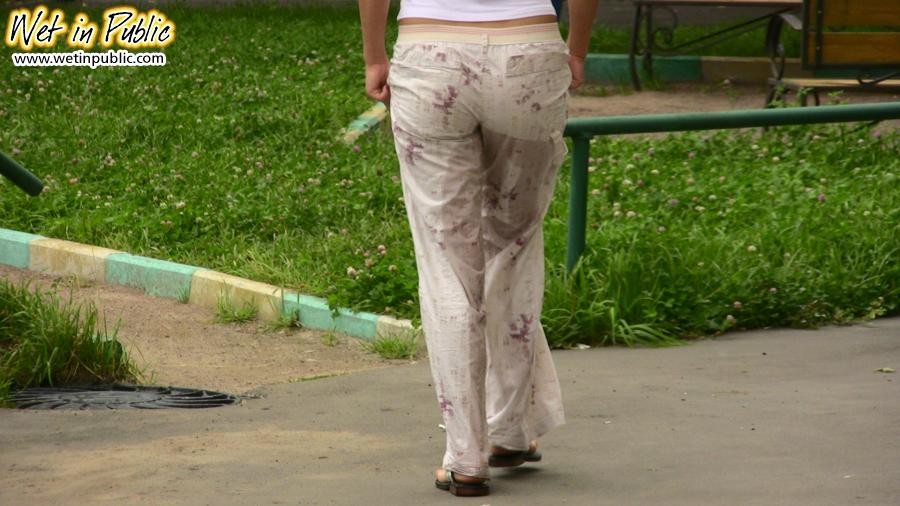 Beige pants of a hottie turn into the wee-soaked rags within a minute #73240852