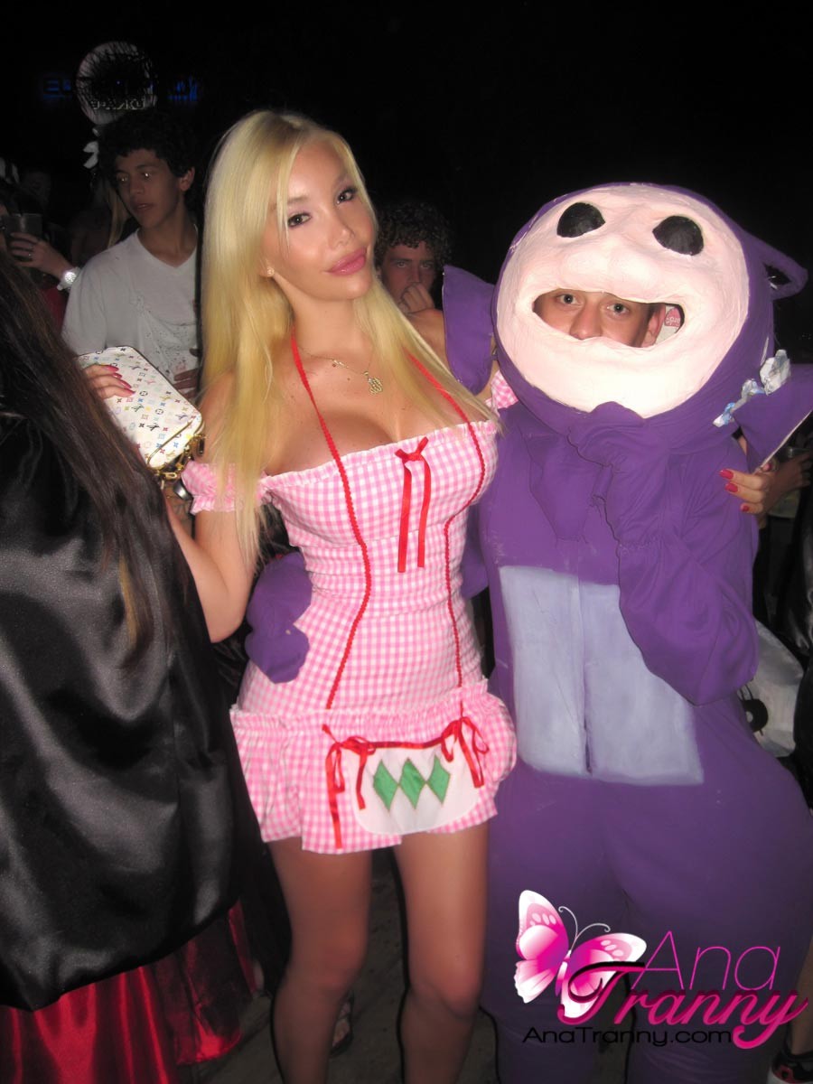 Leggy Tranny with short skirt at a costume party #79214273