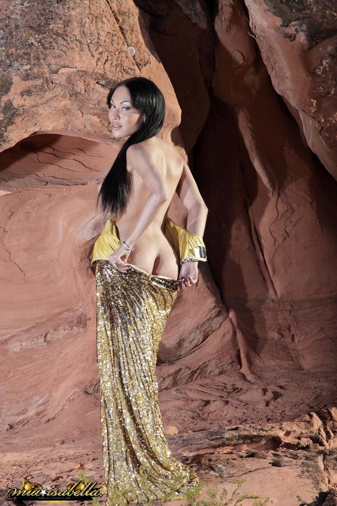 Transsexual beauty Mia Isabella strips in the cave #79201839