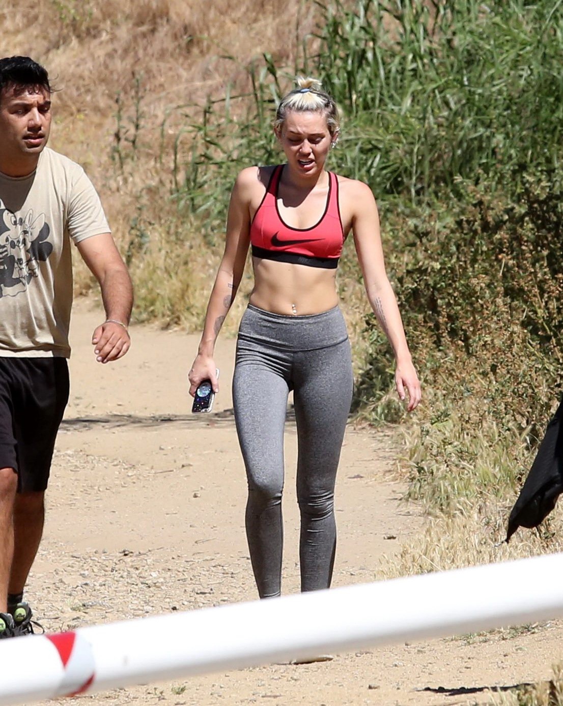 Miley Cyrus in sports bra  tights hiking with friends in LA #75165279