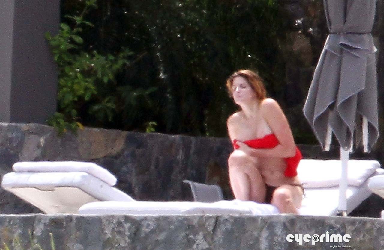 Stephanie Seymour exposing her nice big boobs while sunbathing and in yellow see #75312543